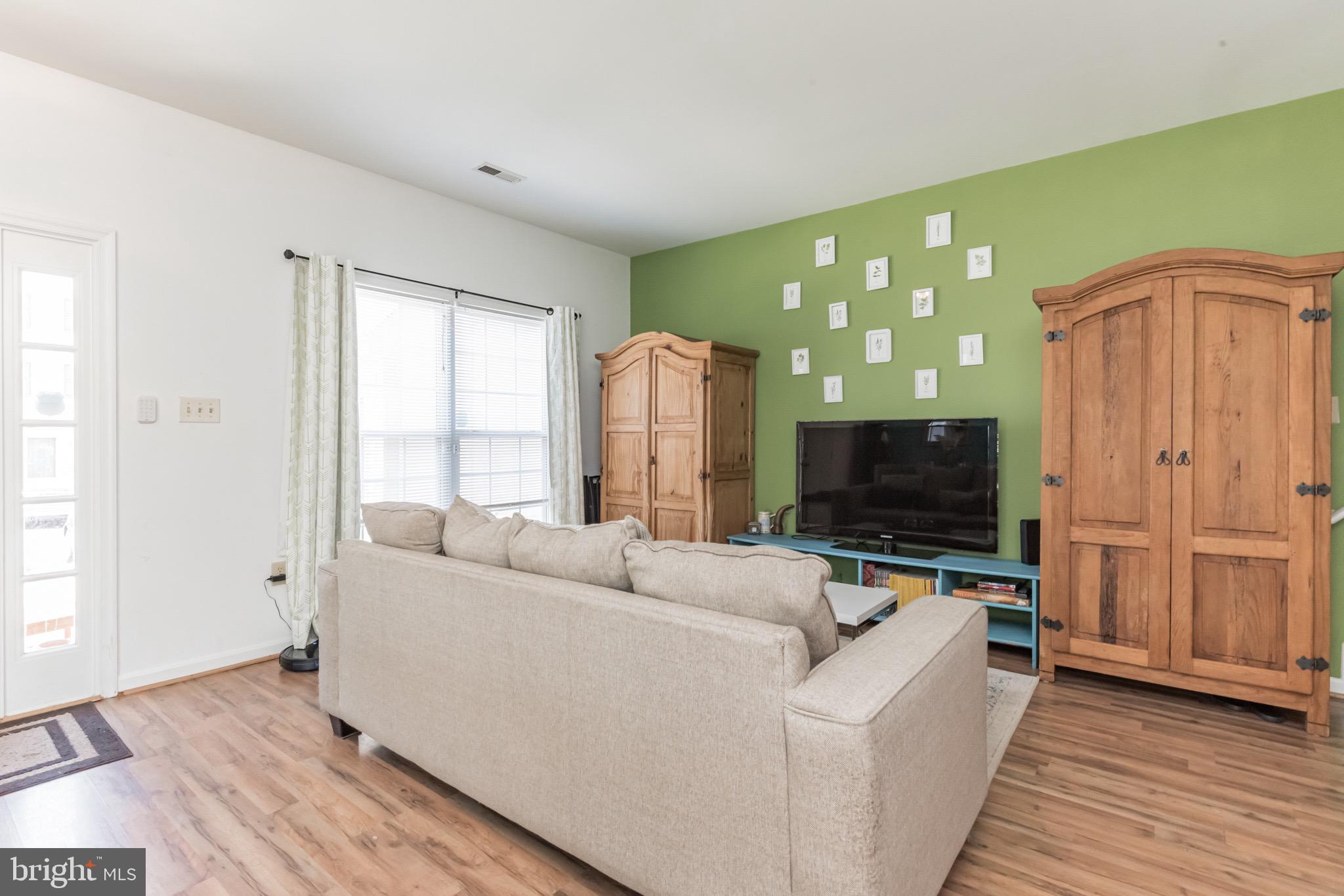 311 Assembly Point Court Odenton, MD 21113 - Photo 7 of 29 Living Room w/Pergo Floors