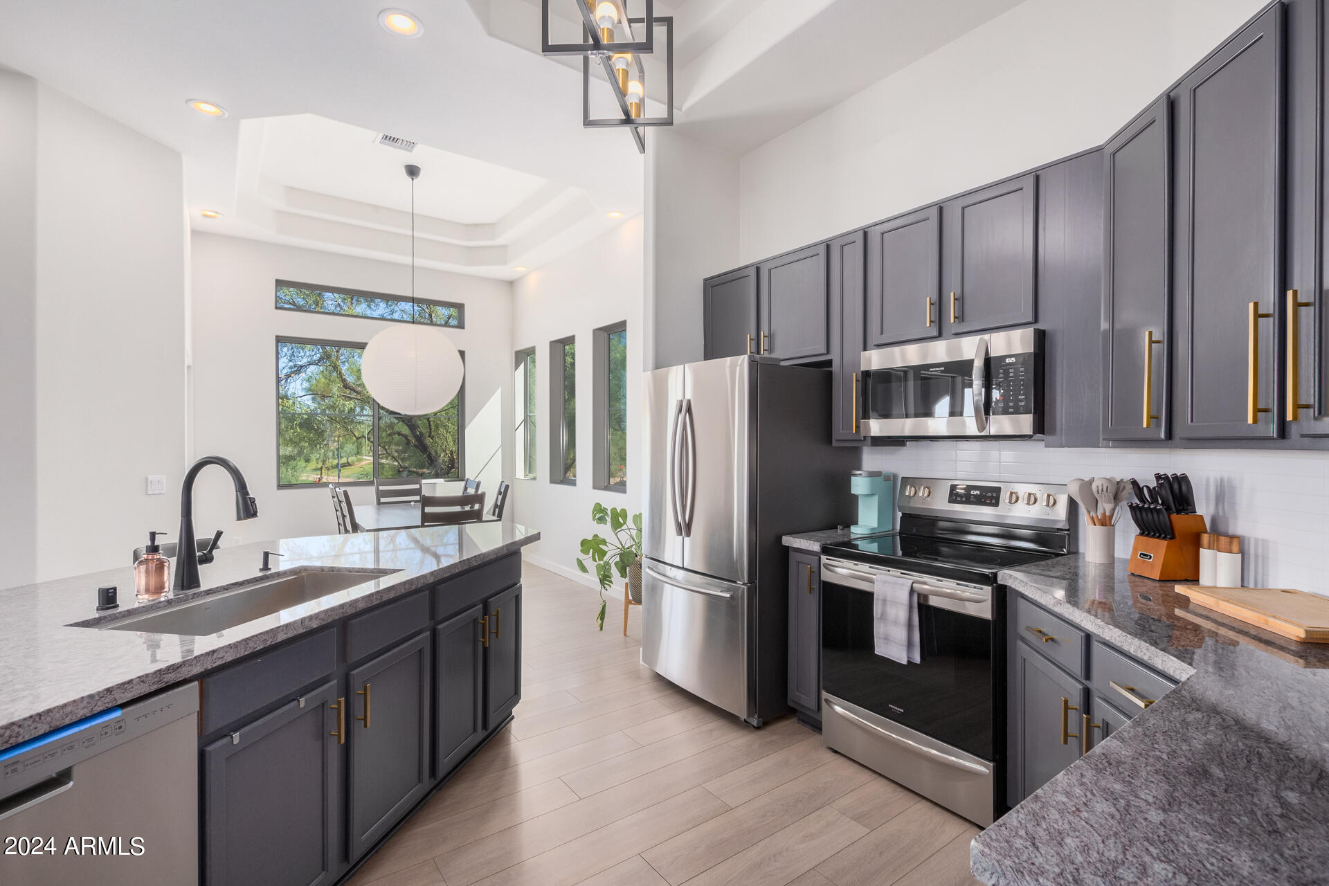 8245 East Bell Road, Unit 240 Scottsdale, AZ 85260 - Photo 8 of 28 Beautifully updated kitchen & lighting