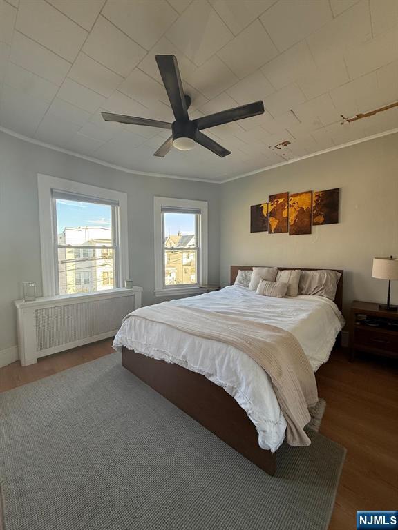 365 3rd Street Clifton, NJ 07011 - Photo 20 of 31 a bedroom with a bed and a window