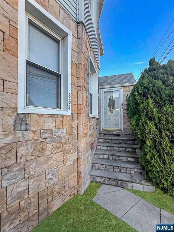 365 3rd Street Clifton, NJ 07011 - Photo 2 of 31 a view of house with yard