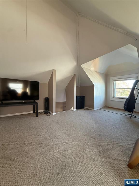 365 3rd Street Clifton, NJ 07011 - Photo 25 of 31 a view of a livingroom with furniture and a flat screen tv
