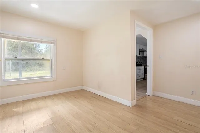 a bathroom with a sink toilet and a mirror
