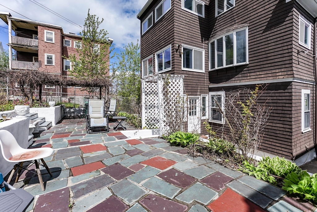 51 Main Street, Unit 2 Somerville, MA 02145 - Photo 22 of 23 a view of backyard with a patio