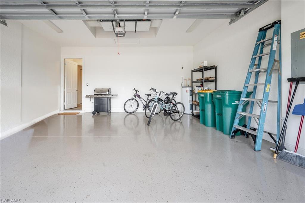 7563 Moorgate Point Way Naples, FL 34113 - Photo 22 of 50 a view of a livingroom with furniture