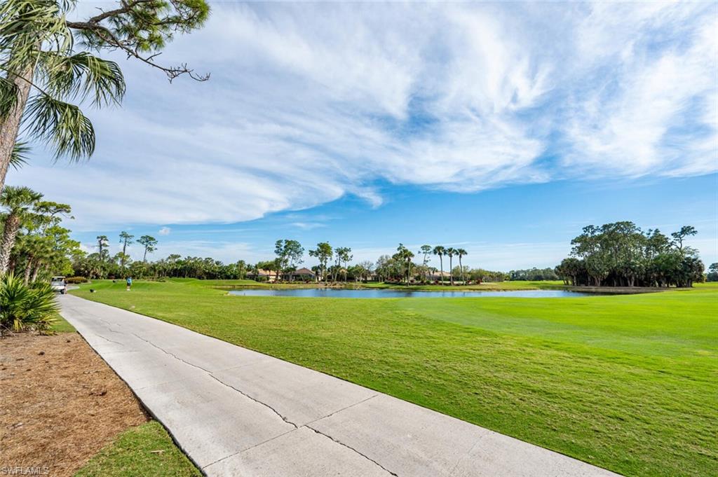 7563 Moorgate Point Way Naples, FL 34113 - Photo 24 of 50 a view of a big yard next to a yard