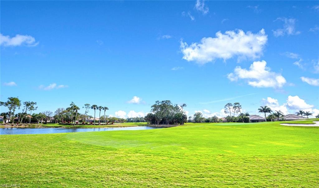 7563 Moorgate Point Way Naples, FL 34113 - Photo 26 of 50 a view of a building with garden