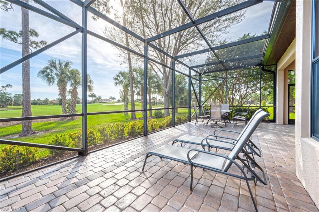 7563 Moorgate Point Way Naples, FL 34113 - Photo 4 of 50 a view of sitting area with furniture and garden