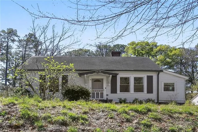 a house view with a garden space