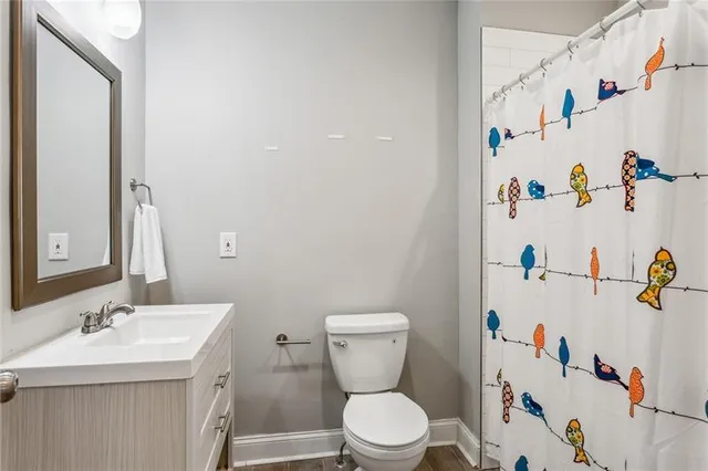 a bathroom with a sink and a toilet