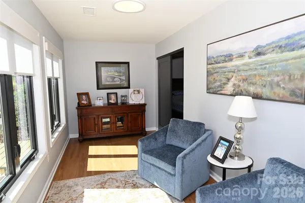 a living room with furniture and a window