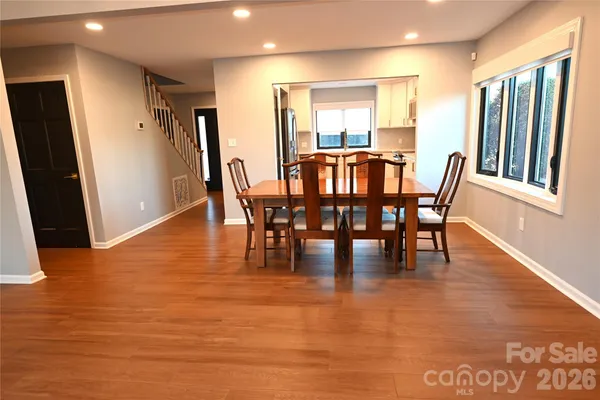 a view of a dining room with furniture