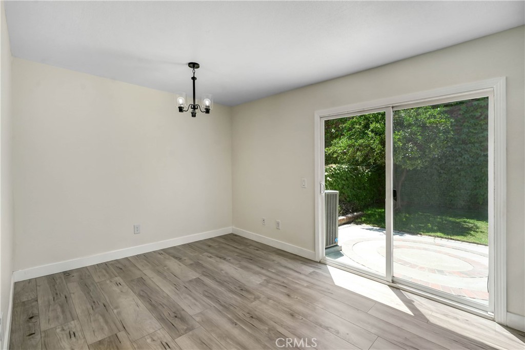 11629 Mt Jefferson Drive Rancho Cucamonga, CA 91737 - Photo 7 of 17 a room that has a glass door