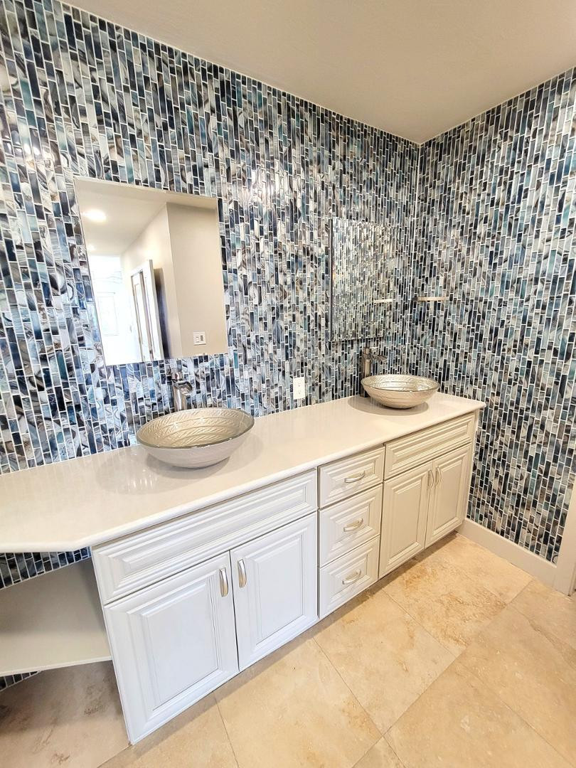 5770 North Scottsdale Road Paradise Valley, AZ 85253 - Photo 12 of 25 a bathroom with a sink and a mirror