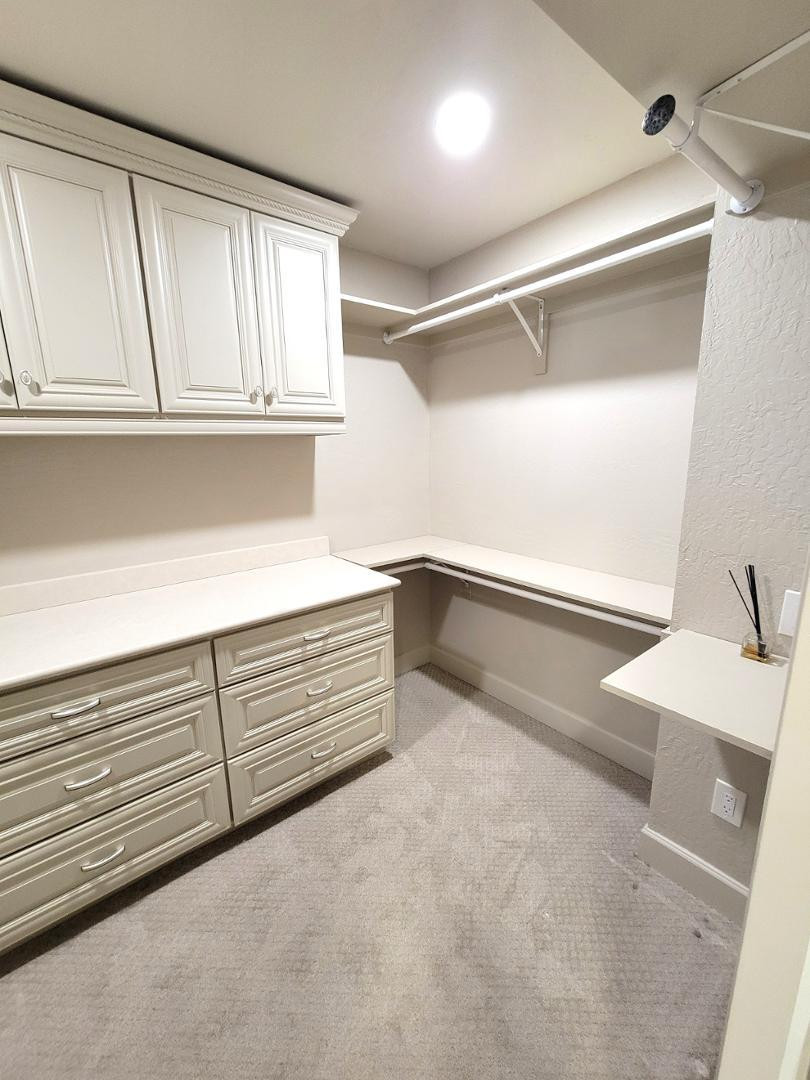 5770 North Scottsdale Road Paradise Valley, AZ 85253 - Photo 14 of 25 a view of an empty walk in closet