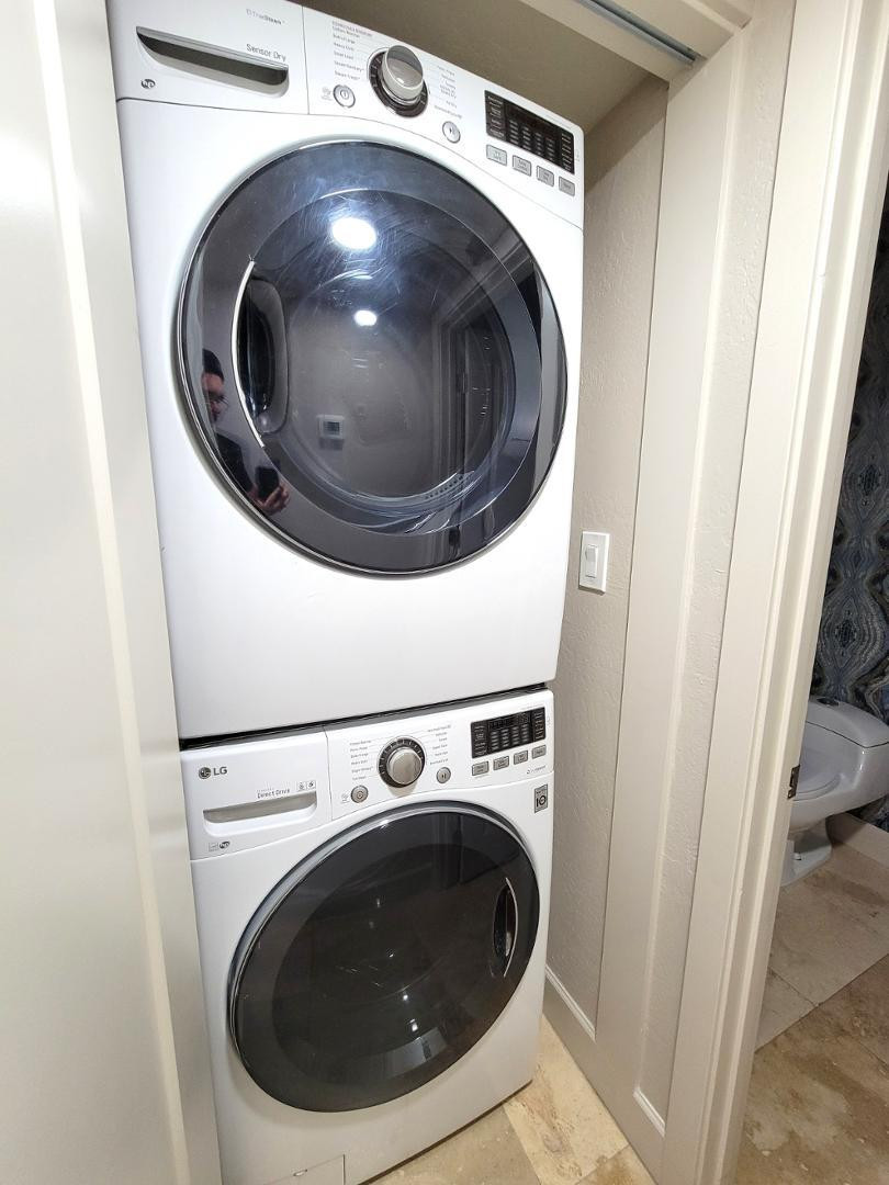 5770 North Scottsdale Road Paradise Valley, AZ 85253 - Photo 22 of 25 a utility room with dryer and washer