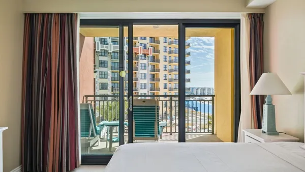a view of a balcony with an ocean view