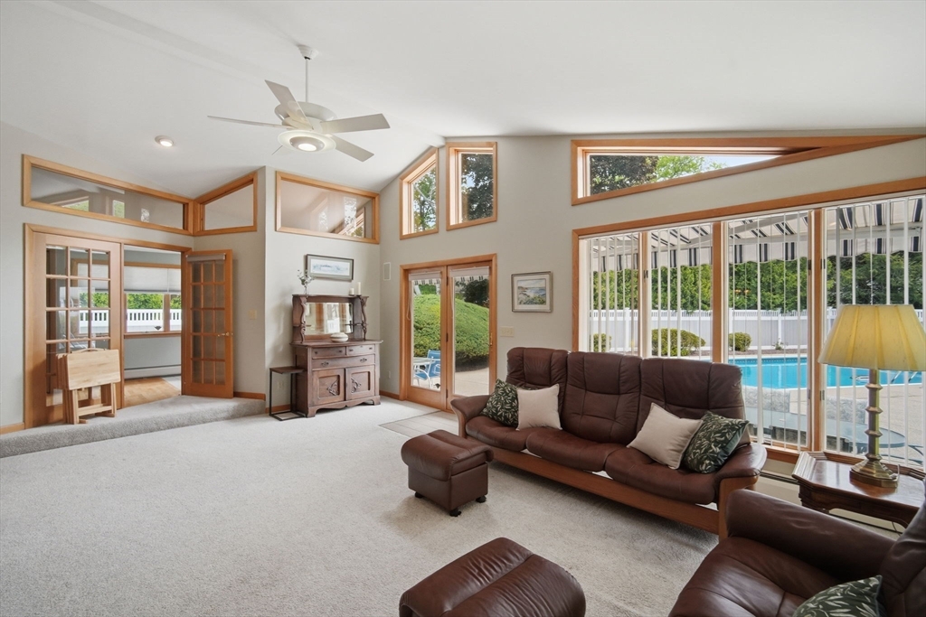 30 Birch Hill Road Northampton, MA 01062 - Photo 15 of 42 a living room with furniture and a large window