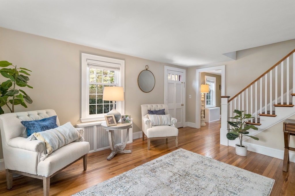 21 Summer Street Sudbury, MA 01776 - Photo 11 of 24 a living room with furniture and a large window
