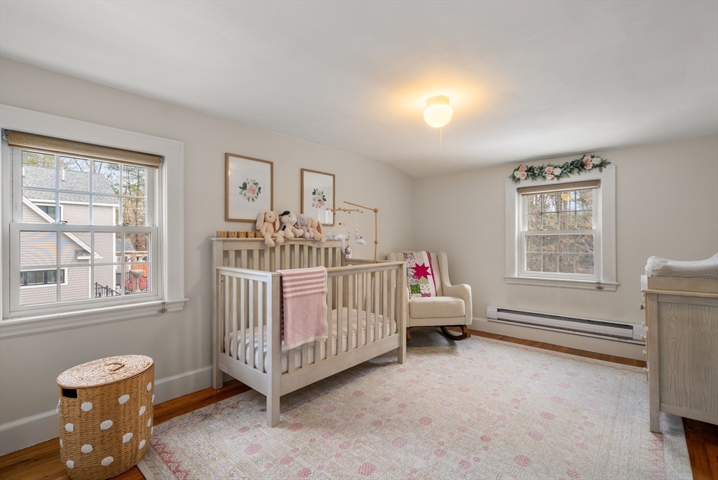 21 Summer Street Sudbury, MA 01776 - Photo 17 of 24 a bedroom with furniture and window