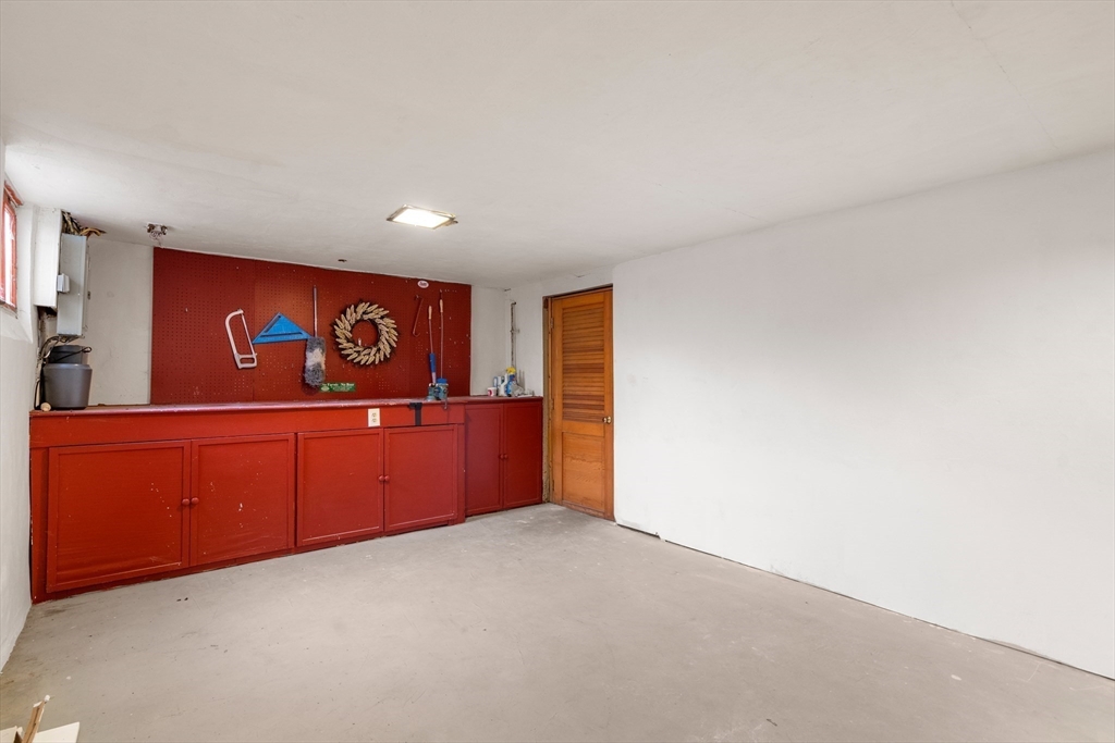 21 Summer Street Sudbury, MA 01776 - Photo 19 of 24 a view of an empty room and a window