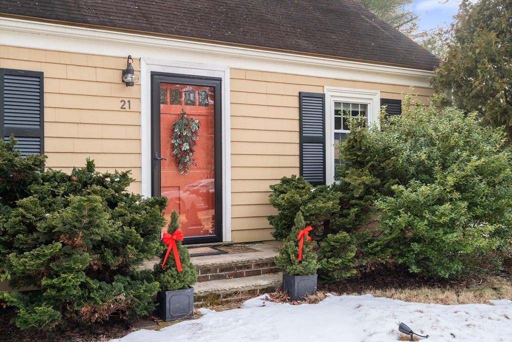 21 Summer Street Sudbury, MA 01776 - Photo 2 of 24 a potted plant sitting in front of a house
