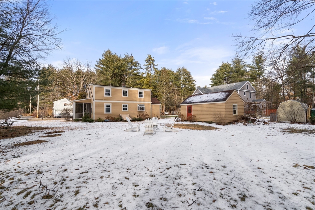 21 Summer Street Sudbury, MA 01776 - Photo 23 of 24 a view of a dry yard with a house