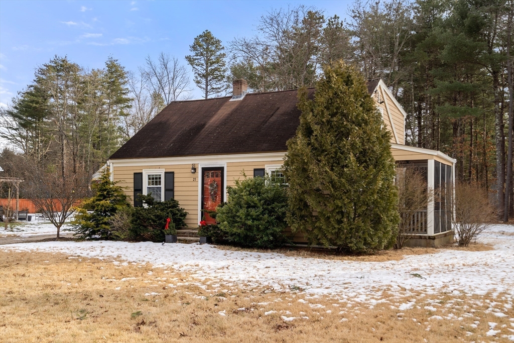 21 Summer Street Sudbury, MA 01776 - Photo 24 of 24 a view of a house with a yard covered in snow