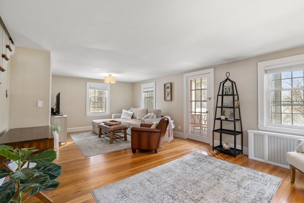 21 Summer Street Sudbury, MA 01776 - Photo 10 of 24 a living room with furniture and wooden floor