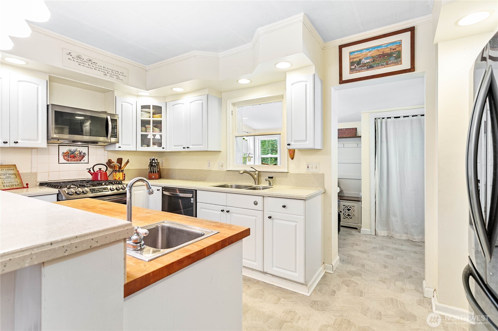 8731 Valley View Road Custer, WA 98240 - Photo 13 of 40 a kitchen with stainless steel appliances granite countertop a refrigerator sink and stove