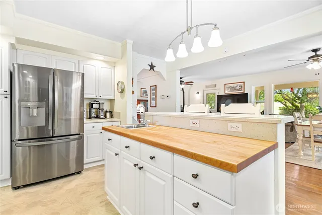 a very nice looking dining room with a large window