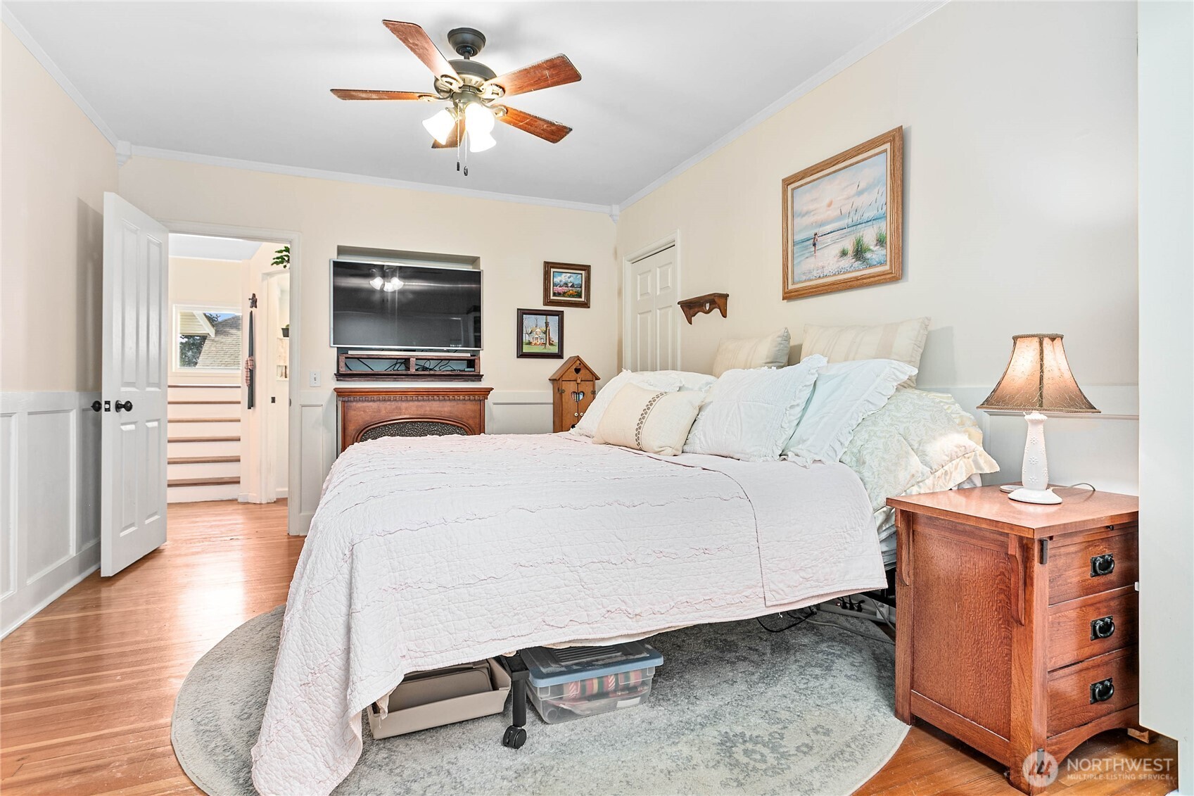 8731 Valley View Road Custer, WA 98240 - Photo 19 of 40 a bedroom with a bed and a flat screen tv