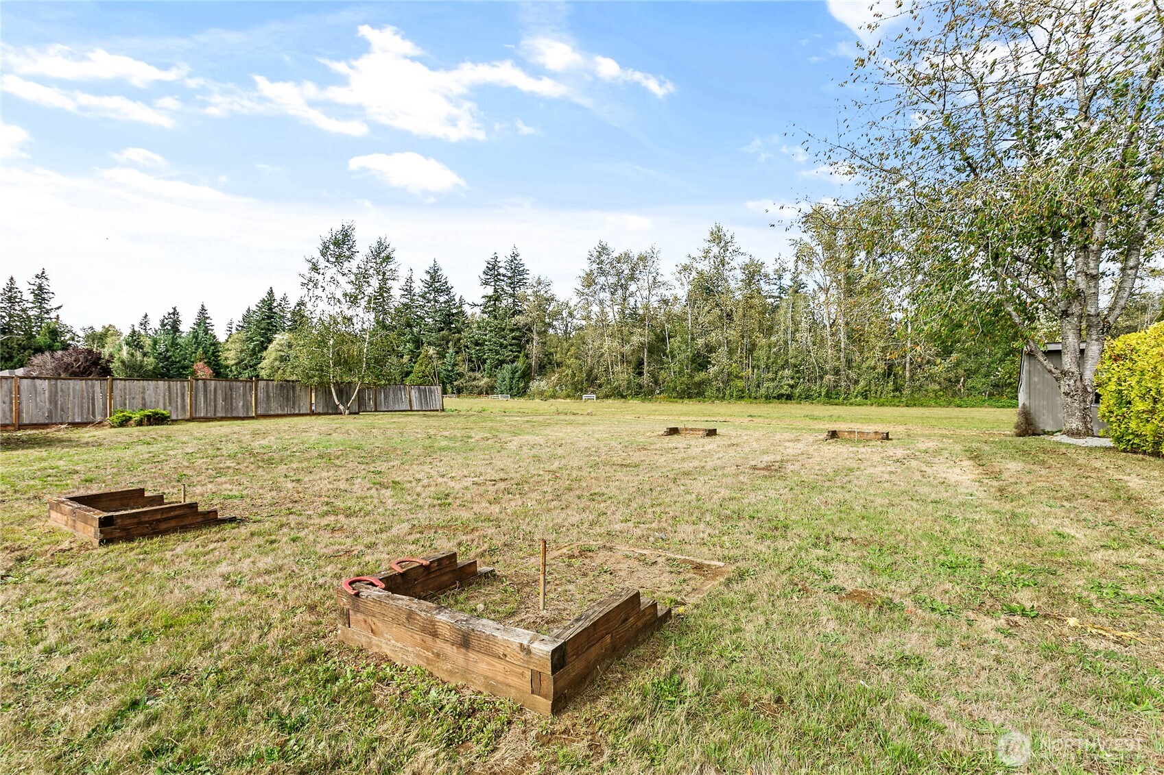 8731 Valley View Road Custer, WA 98240 - Photo 33 of 40 a backyard of a house with lots of green space