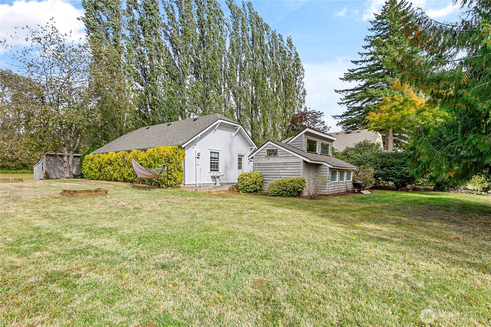 8731 Valley View Road Custer, WA 98240 - Photo 34 of 40 a view of a house with a yard and large trees