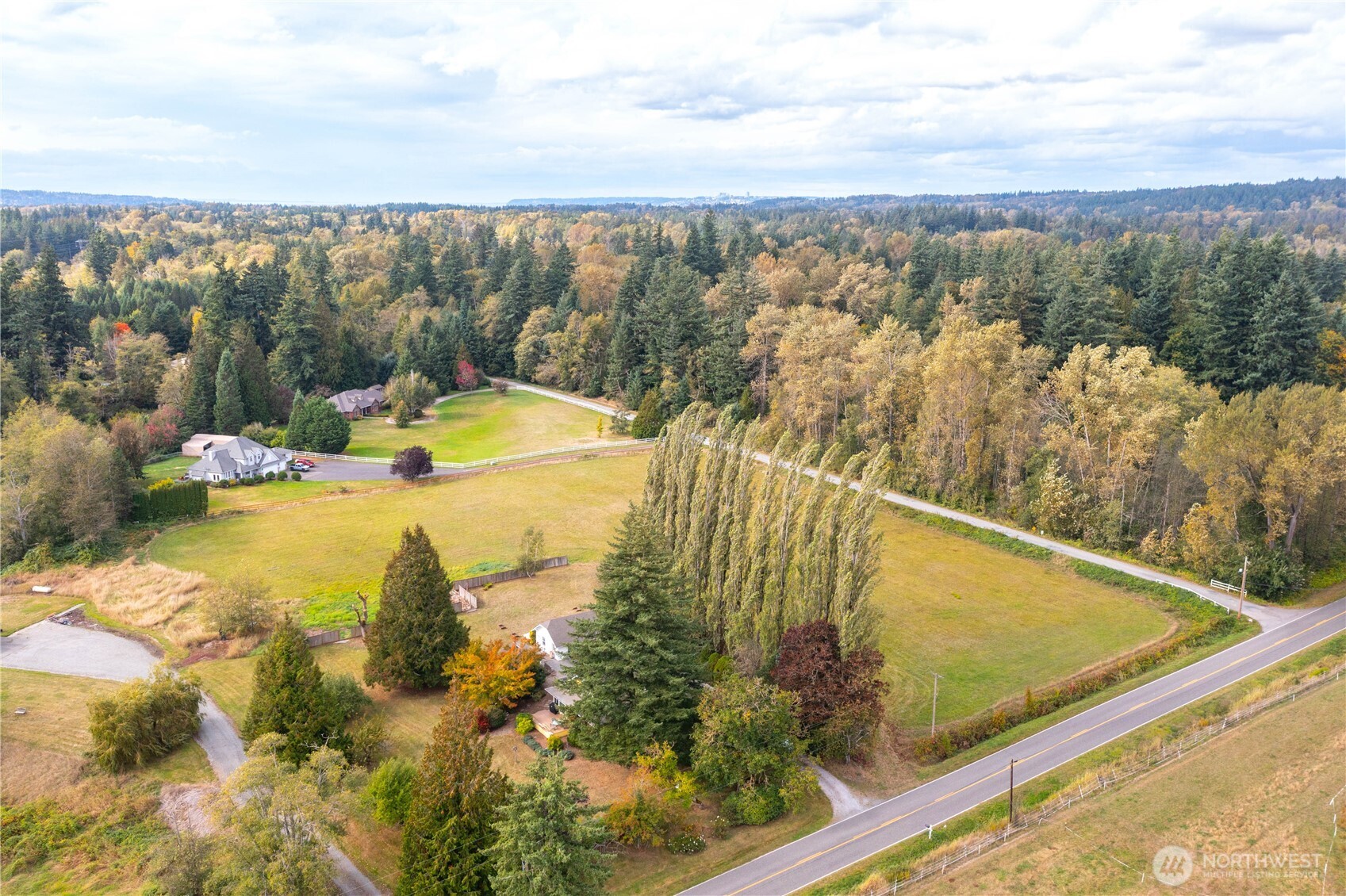 8731 Valley View Road Custer, WA 98240 - Photo 37 of 40 a view of a lake with a yard