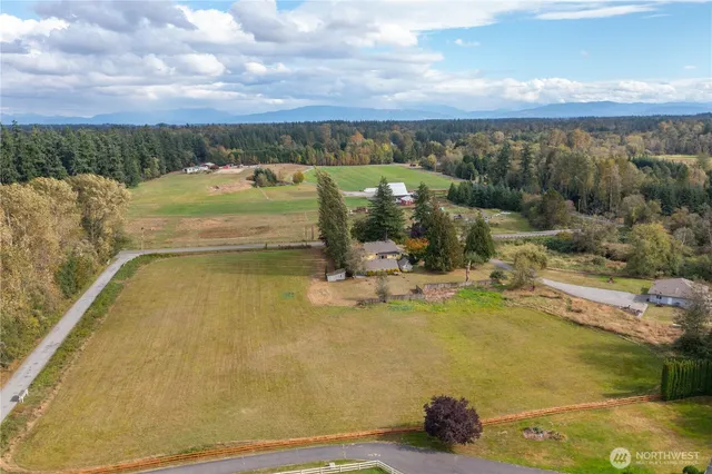 a view of a swimming pool and an outdoor seating
