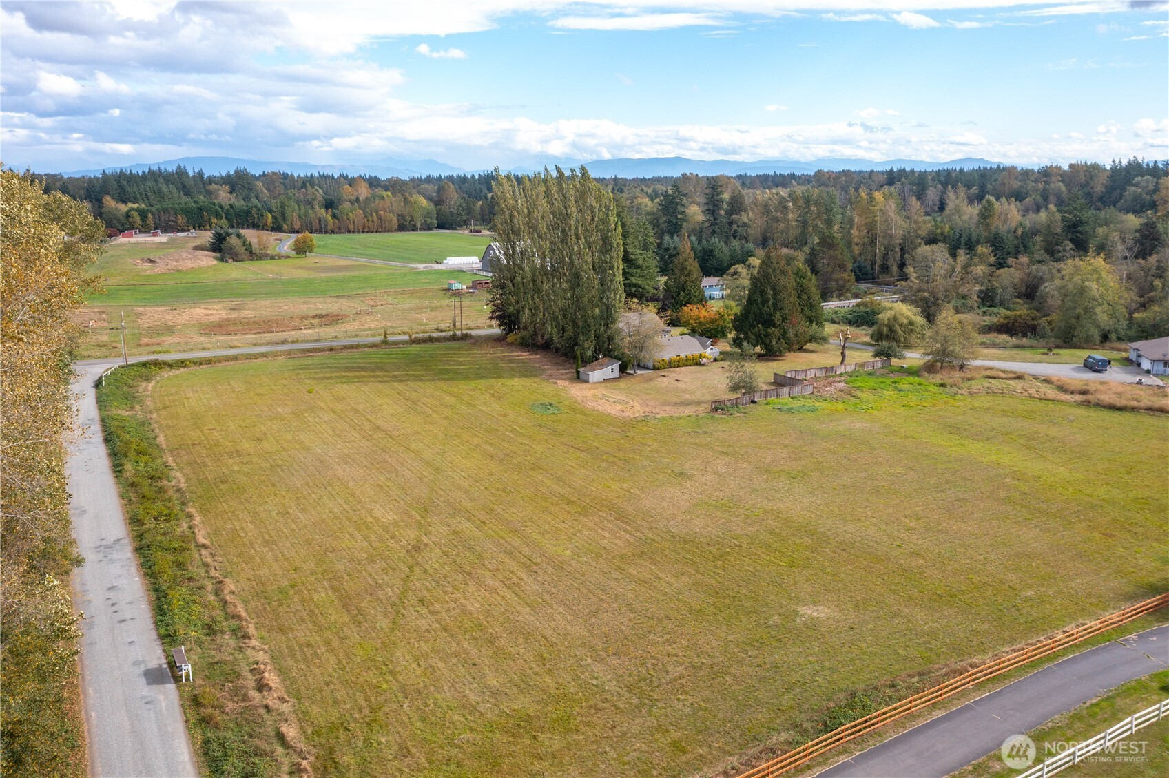 8731 Valley View Road Custer, WA 98240 - Photo 40 of 40 a view of a swimming pool and an outdoor seating