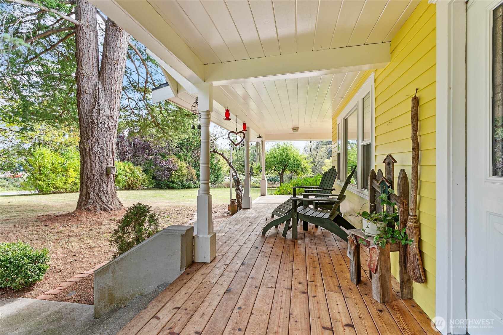 8731 Valley View Road Custer, WA 98240 - Photo 4 of 40 a view of a patio with wooden floor and iron stairs