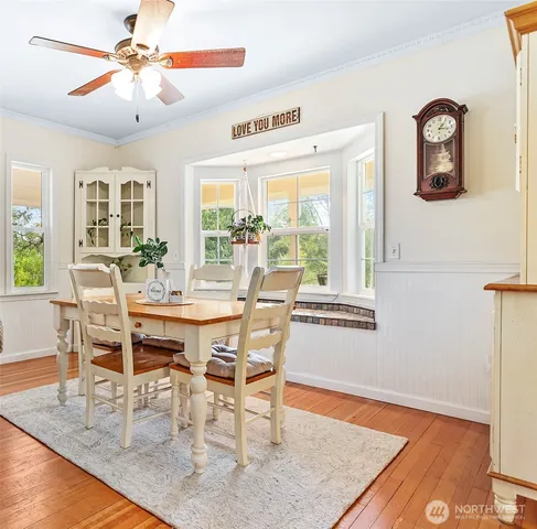 a kitchen with granite countertop a sink stove and cabinets