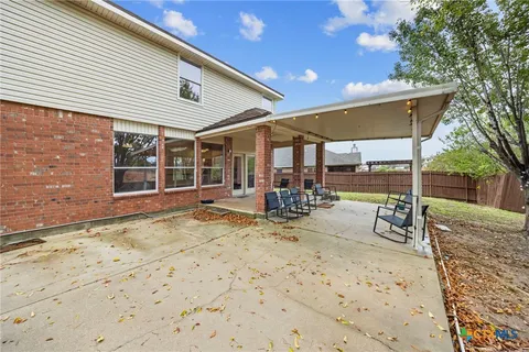 a view of a outdoor space with porch and patio