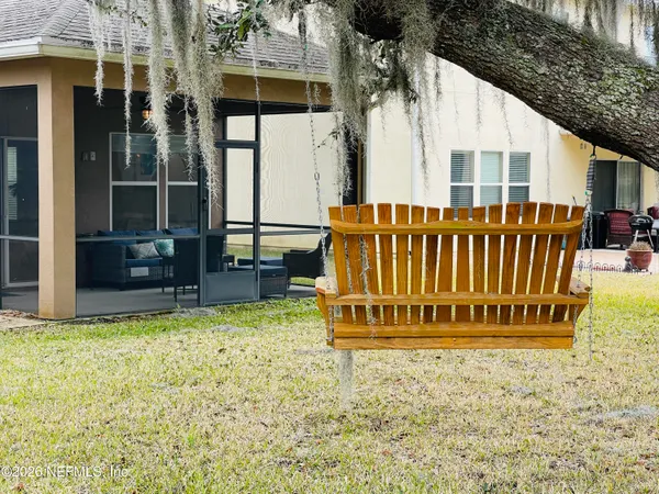 a view of a chair in front of house