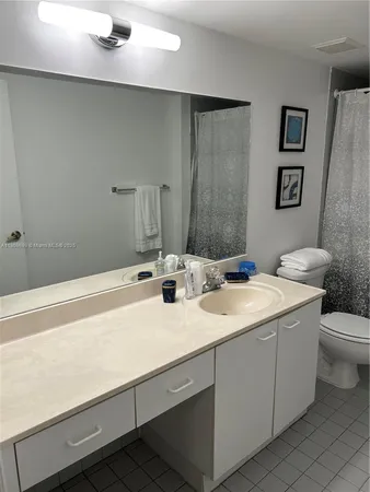 a view of bathroom with a sink and a toilet