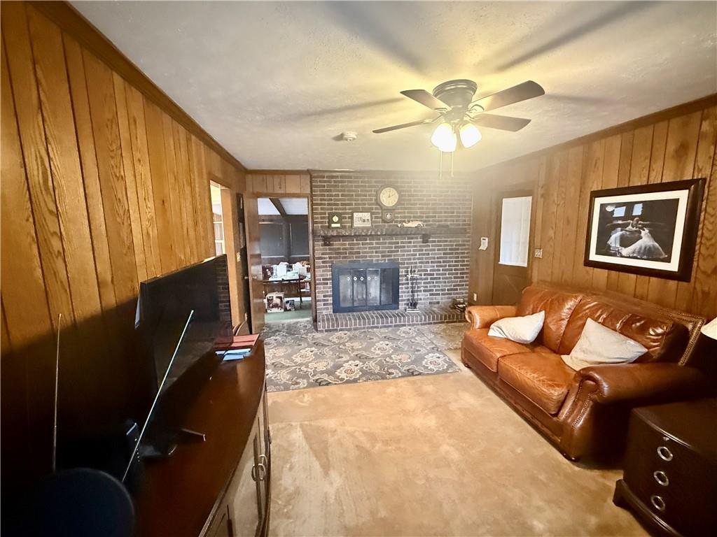 5705 Orly Terrace Atlanta, GA 30349 - Photo 17 of 42 a living room with furniture and a fireplace