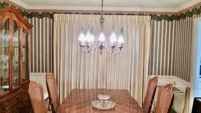 5705 Orly Terrace Atlanta, GA 30349 - Photo 23 of 42 a bathroom with a shower and a curtain