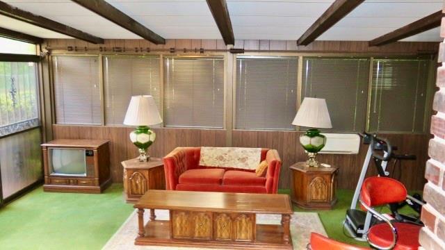 5705 Orly Terrace Atlanta, GA 30349 - Photo 24 of 42 a living room with furniture and a table