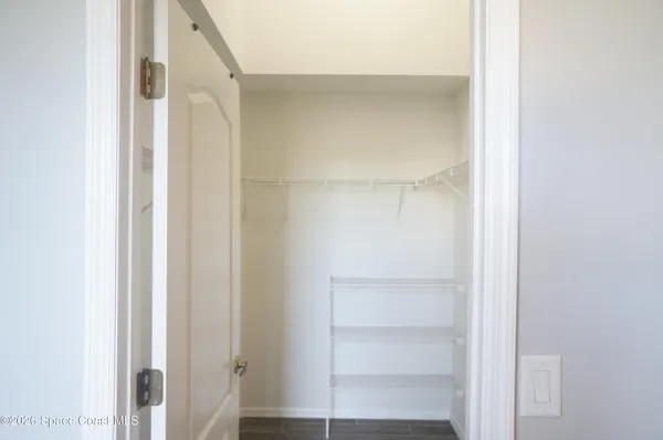 a bathroom with a toilet a sink and shower