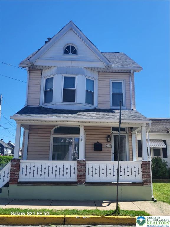 a view of a building with a street