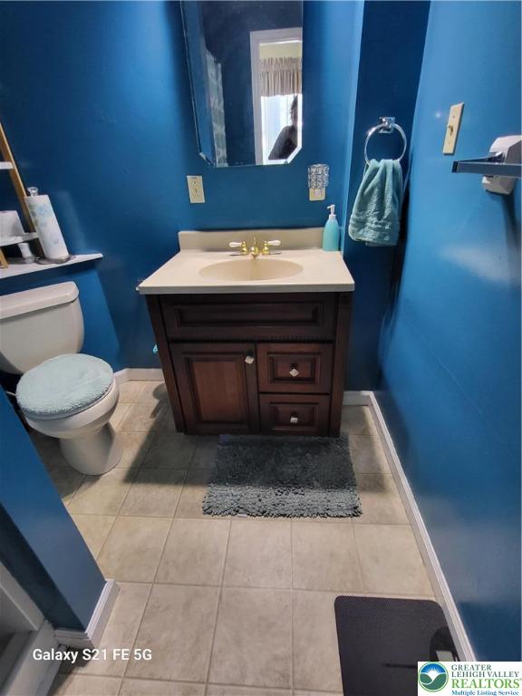 37 6th Street Emmaus, PA 18049 - Photo 14 of 31 a bathroom with a sink toilet and mirror