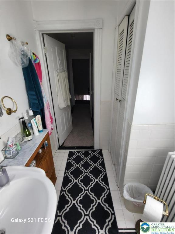 37 6th Street Emmaus, PA 18049 - Photo 17 of 31 a bathroom with a sink and a mirror