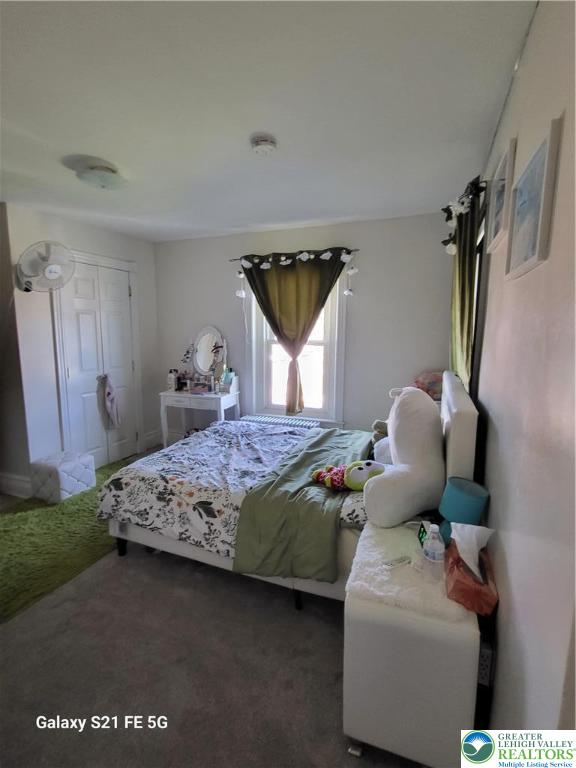 37 6th Street Emmaus, PA 18049 - Photo 20 of 31 a bedroom with a bed and wooden floor