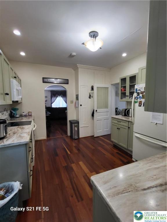 37 6th Street Emmaus, PA 18049 - Photo 6 of 31 a kitchen with stainless steel appliances granite countertop a stove a sink and a refrigerator